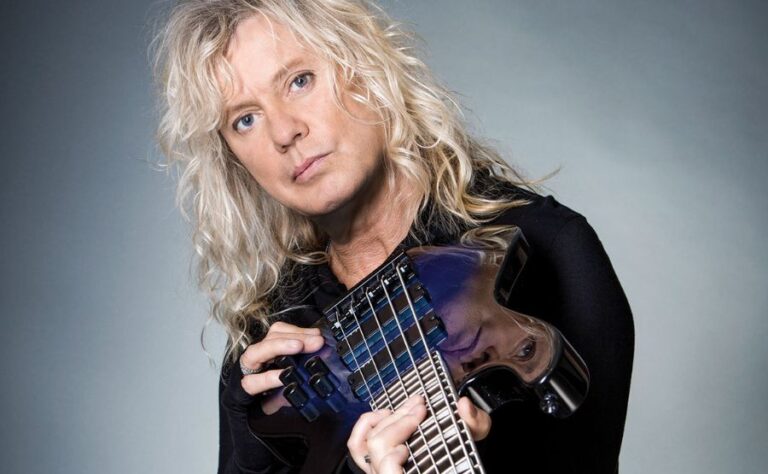 Rick Savage: The Story Behind Def Leppard’s Legendary Bass Player